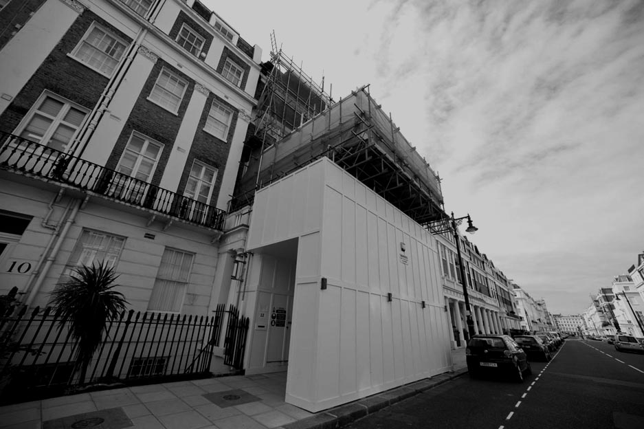 A large town house that is being renovated.